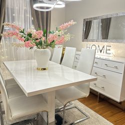 Dinning Table With 6 Chairs, Storage Drawers, Chandelier And A Mirror 