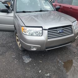07 SUBARU FORESTER  LEFT SIDE HEADLIGHT ASSEMBLY ASSEMBLY 
