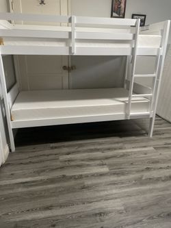 Twin over twin bunk bed. White or espresso. Assembly required. Assembly not included. Taxes included. Free delivery.  Bunk Bed only without Assembly-$
