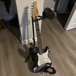 Electric guitar and stand 