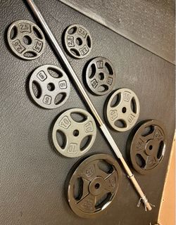 Standard Steel 6 ft Brand New Bar with pair of Cast Iron Plates of 25#, 10# , 5# and 2.5 pounders. Brute Weight: 105#