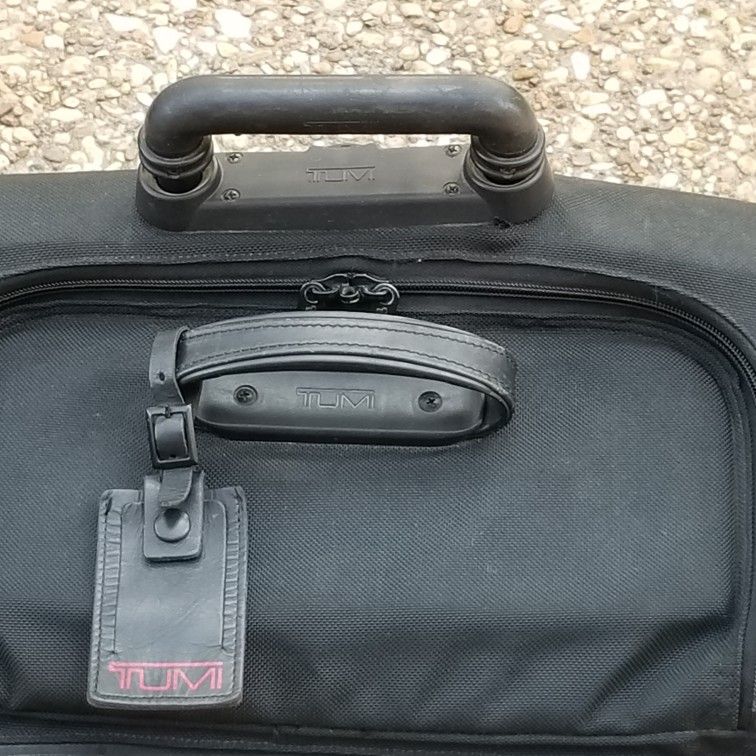 TUMI ALPHA compact rolling duffle and convertible laptop business bag

