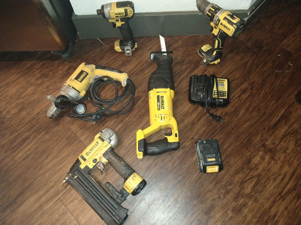 DeWalt Tools 20 v 1 Hammer Drill 1 impact drill 1 saw and 1 charger and 1 battery and 1 Nail gun 18 Gauge and 1 drill VSR Drill 120 volt