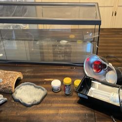 REPTILE FISH TANK BRAND NEW CHEAP - heating lamp - regular light - rock structures/ Feeding bowls