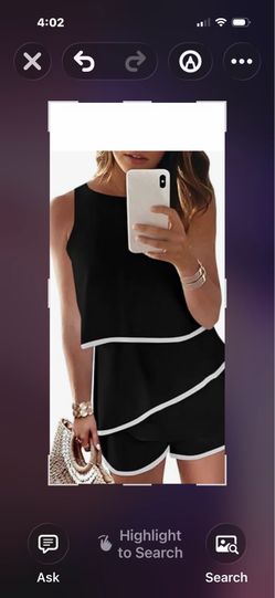 Women’s romper by Dokotoo. Size L Black with white stripes.