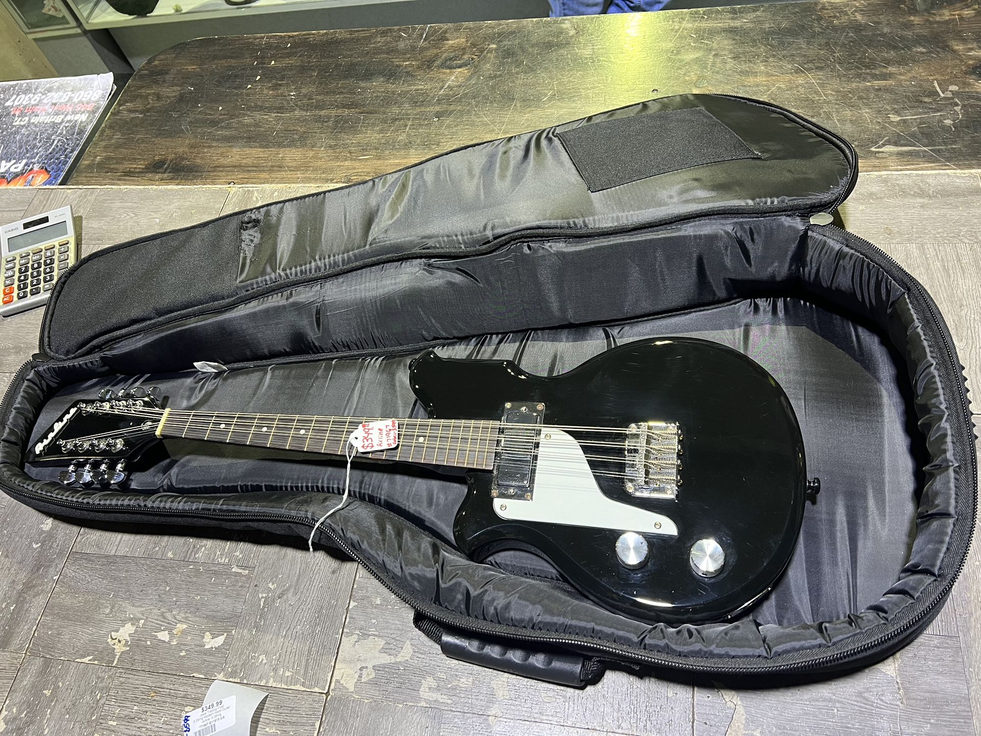 Left Handed 8 string Modern Airline guitar with case pick up only