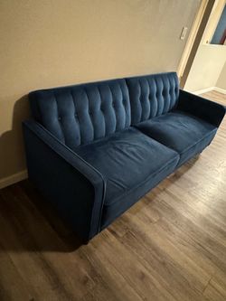 Blue futon couch
