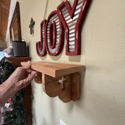 Rustic Wooden Wall Shelf with Cross Carving — Decorative Accent