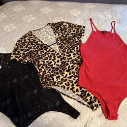 Body Suits Black is Large Size The Other Two Are Extra Large Size $10 Each 