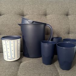 Tupperware set of container, 4 cups, and a jar