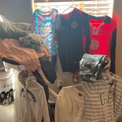 Sweaters, Shirts, Jeans And More Clothes 