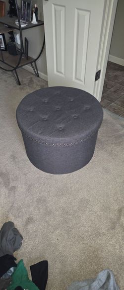Round grey ottoman storage