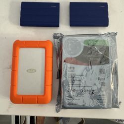LACIE RUGGED 4TB External (1) / Samsung T7 2TB (2) / Seagate IronWolf 12TB ST12000VN008