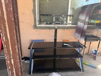 Tv and this stand take both