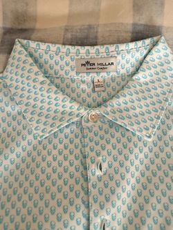Peter Millar golf shirts and pants