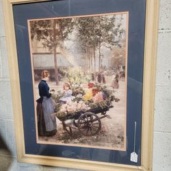 Girl In The Flower Cart Framed Art