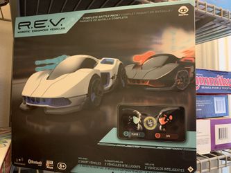 Race cars using phone app: WowWee Robotic Enhanced Vehicles (R.E.V)