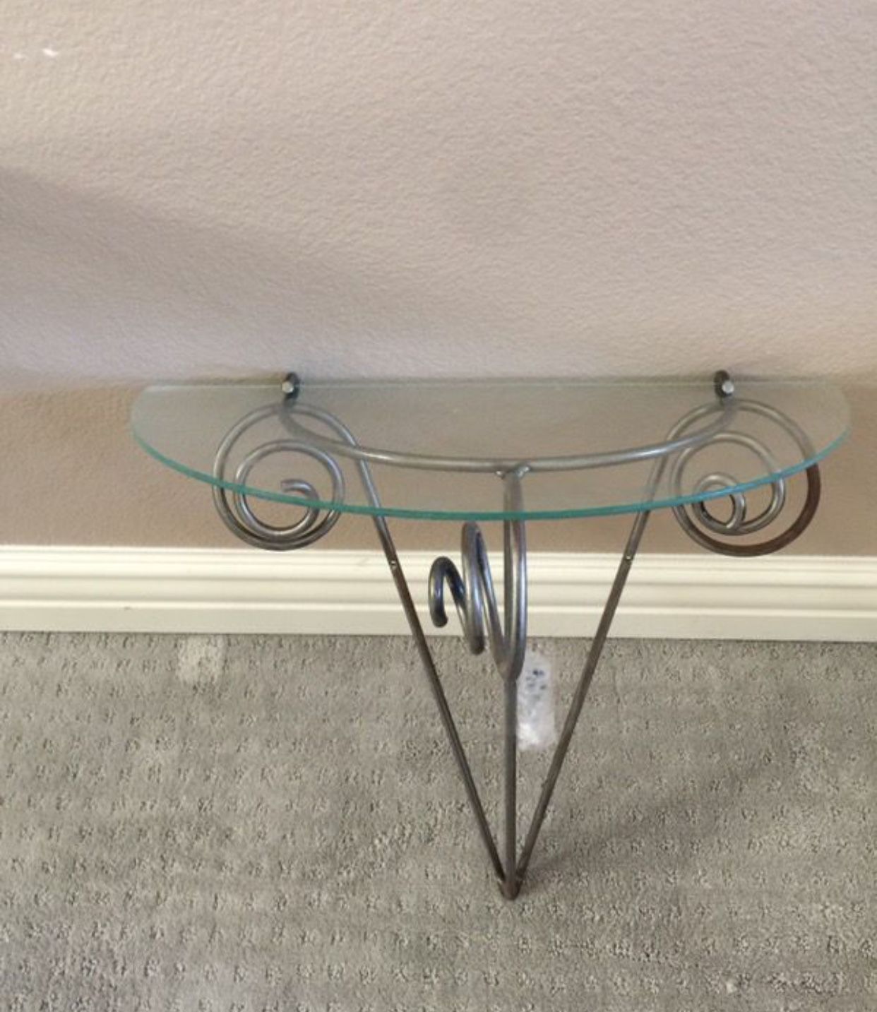 Wrought iron glass wall shelves