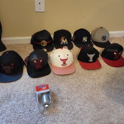 A BUNCH OF OLD FITTED NEW ERA CAPS