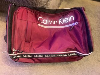 Calvin Klein Softside Rolling Duffel Luggage Bag