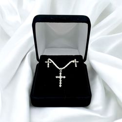 14kt 2.20g White Gold with Small Round Diamonds Cross Pendant and Baguette/Small Round Cut Diamond Cross Earrings.