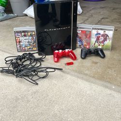 PS3 with three games and two controllers, wires included. 