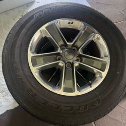 Bridgestone tires and rims 4 plus a spare