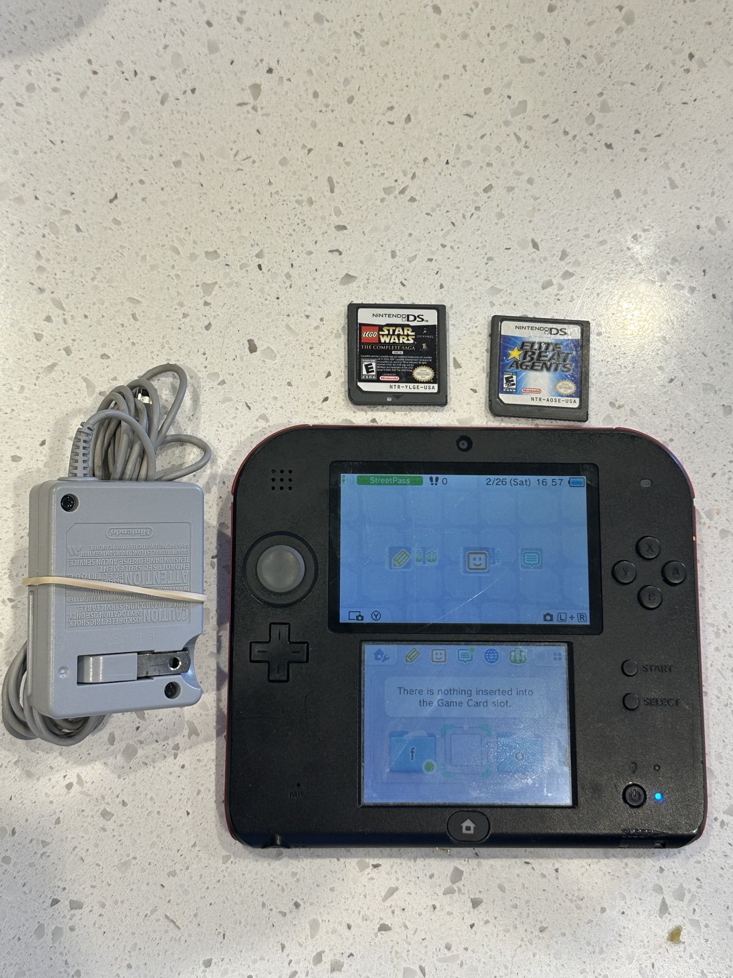 Nintendo 2ds with charger and 2 games