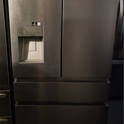 STAINLESS STEEL FRENCH DOOR REFRIGERATOR ....4 DOORS..WITH ICE MAKER AND WATER DISPENSER ON DOOR.....$ 700