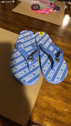 New Michael kors flip flops size 9
