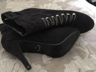 Black suede booties.