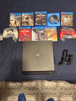 PS4 Pro Bundle with 8 Games and 2 Controllers