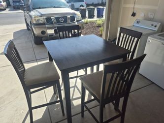 Table and four chairs