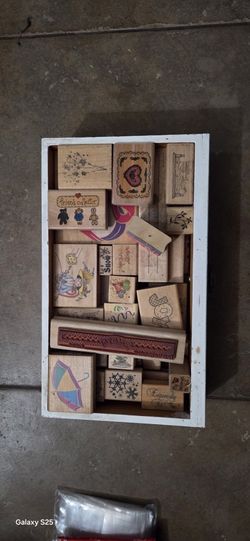 assorted wood-mounted rubber stamps. 