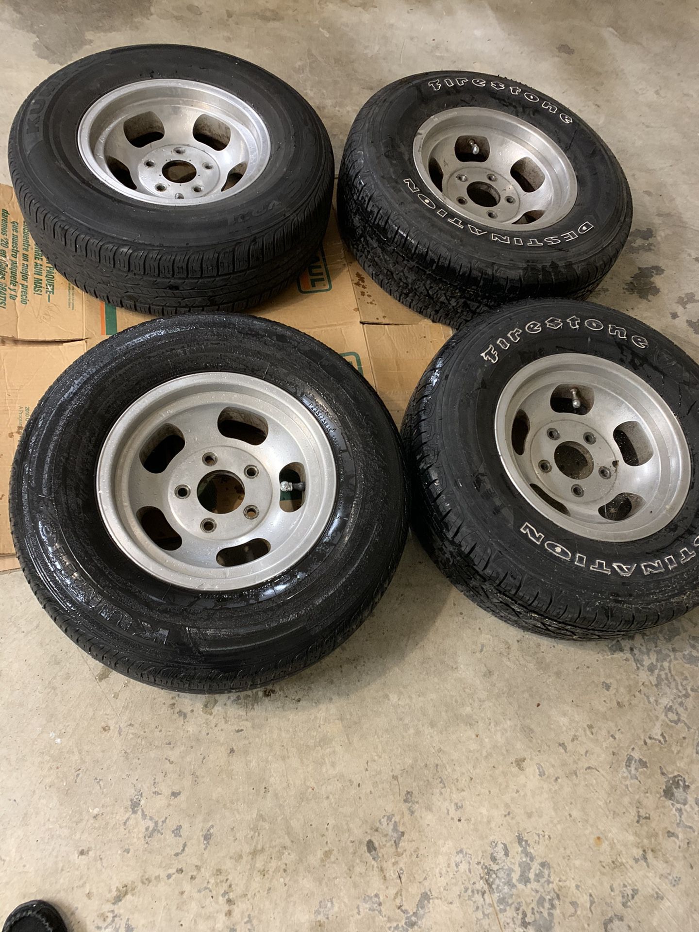 Ford Jeep Dodge Truck or Van size slotted mag wheels with two almost new tires!