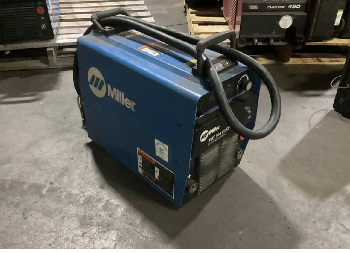 Miller XMT 304 CC/CV Dc Inverter Arc Welder 300a Amp 32v-dc 230/460v-ac