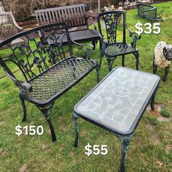 Iron Patio Loveseat $100, chair $35 and matching coffee table $50 with rose design