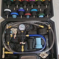 This is a cooling system pressure tester and vacuum refill kit.

It is a comprehensive 28-piece kit designed for diagnosing cooling system problems.

