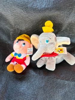 Disney vintage Pinocchio and dumbo plushies