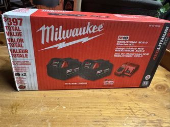 Milwaukee M18 18 Volt Lithium-Ion XC (2) 5.0AH Batteries And Charger
