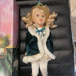 Collectible porcelain doll  Christmas