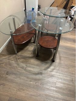 Three glass tables