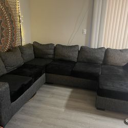 Black Sectional With Cushion Covers 