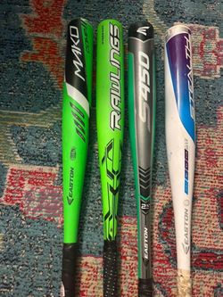 4 baseball bats. Aluminum + 1 wooden. Barely used, in excellent condition, made of aluminum, sizes 29/27/30/26 inches. I'm not selling them separately
