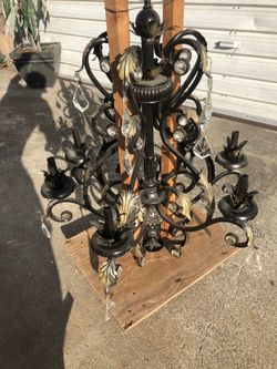 Chandelier vintage I have all the glass earrings that hang all the way around all steel rod iron