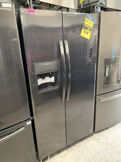 Frigidaire side by side in dark stainless