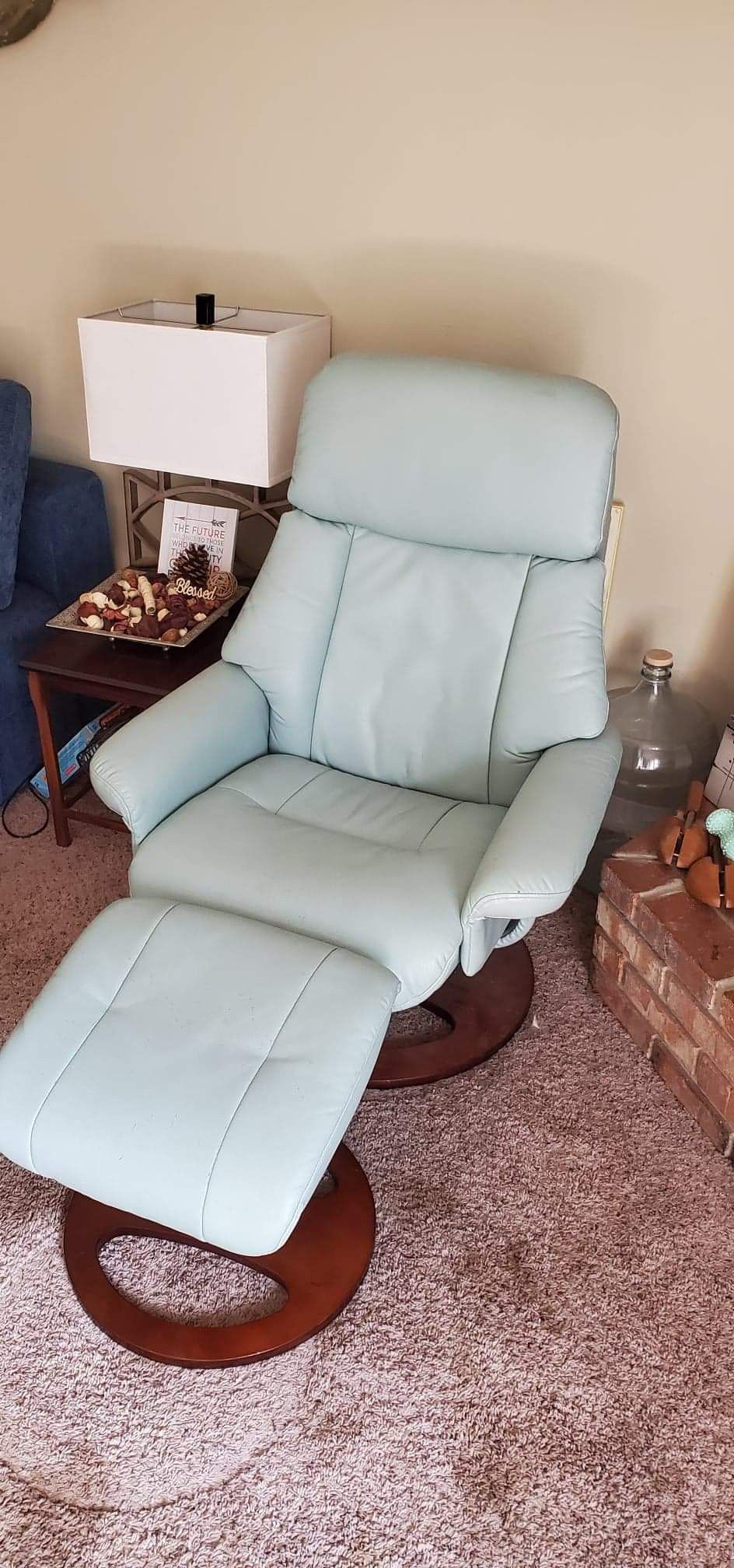 Amazing leather recliner and ottoman.. chair swivels too!!! Beautiful color!!!
