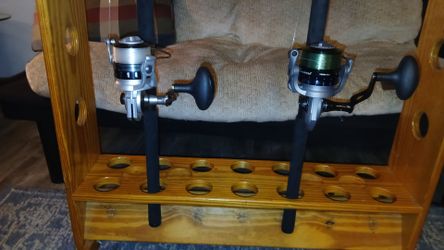 2New Strong Salt water reeks 1)Tsunami BARRIER ll 6000 1)new OZARK TRAIL 5000 both on 2 New Penn Wrath 2 piece 7'0 rods