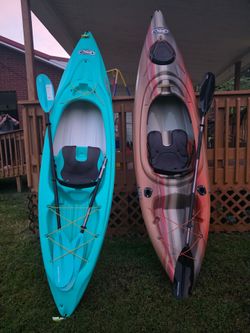 Two Pelican kayaks