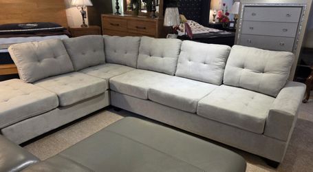 2-Piece Reversible Sectional with Drop-Down Cup Holders